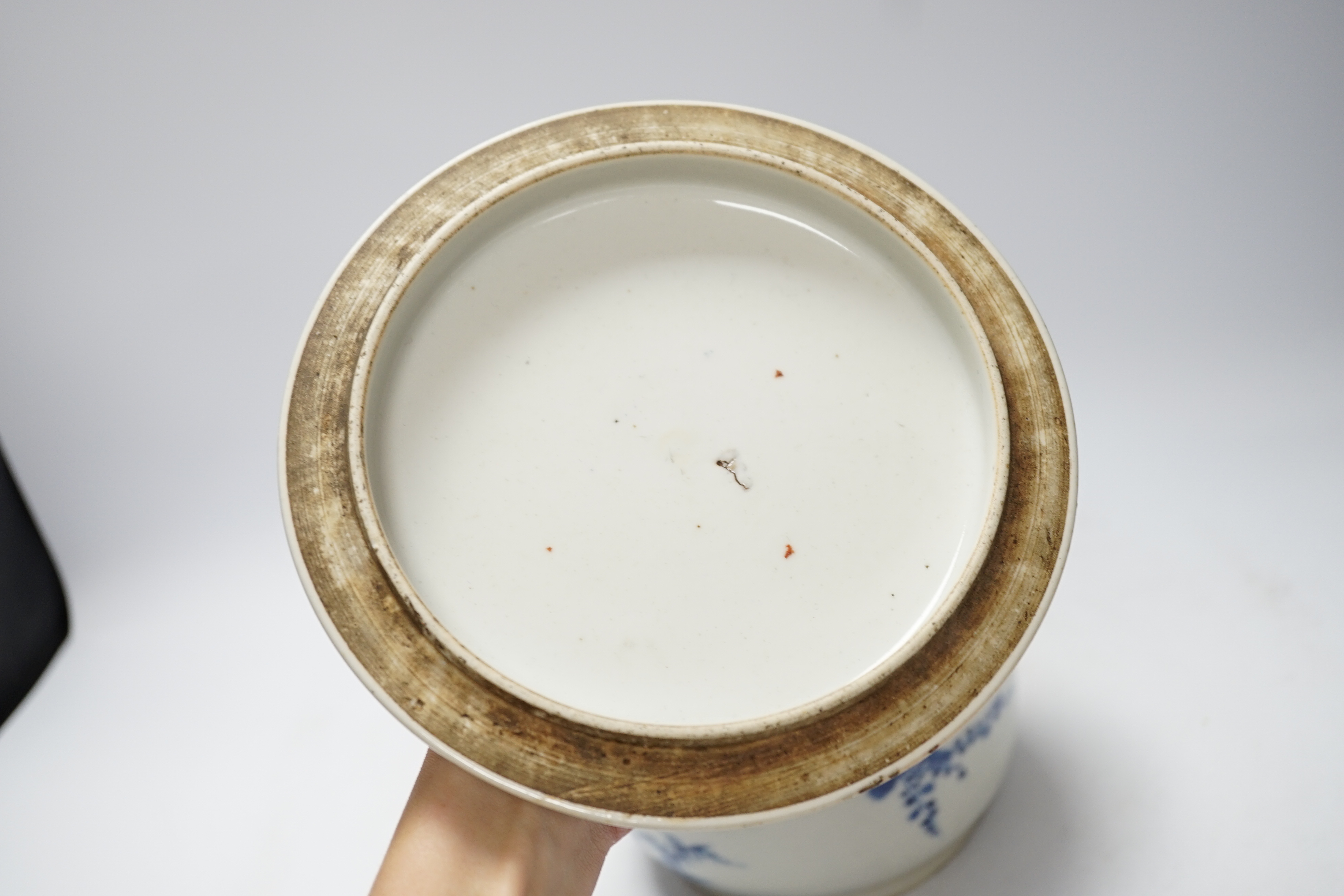 A Chinese porcelain blue and white inscribed jar and cover, 19th century, possibly made for the Vietnamese market, 18cm high